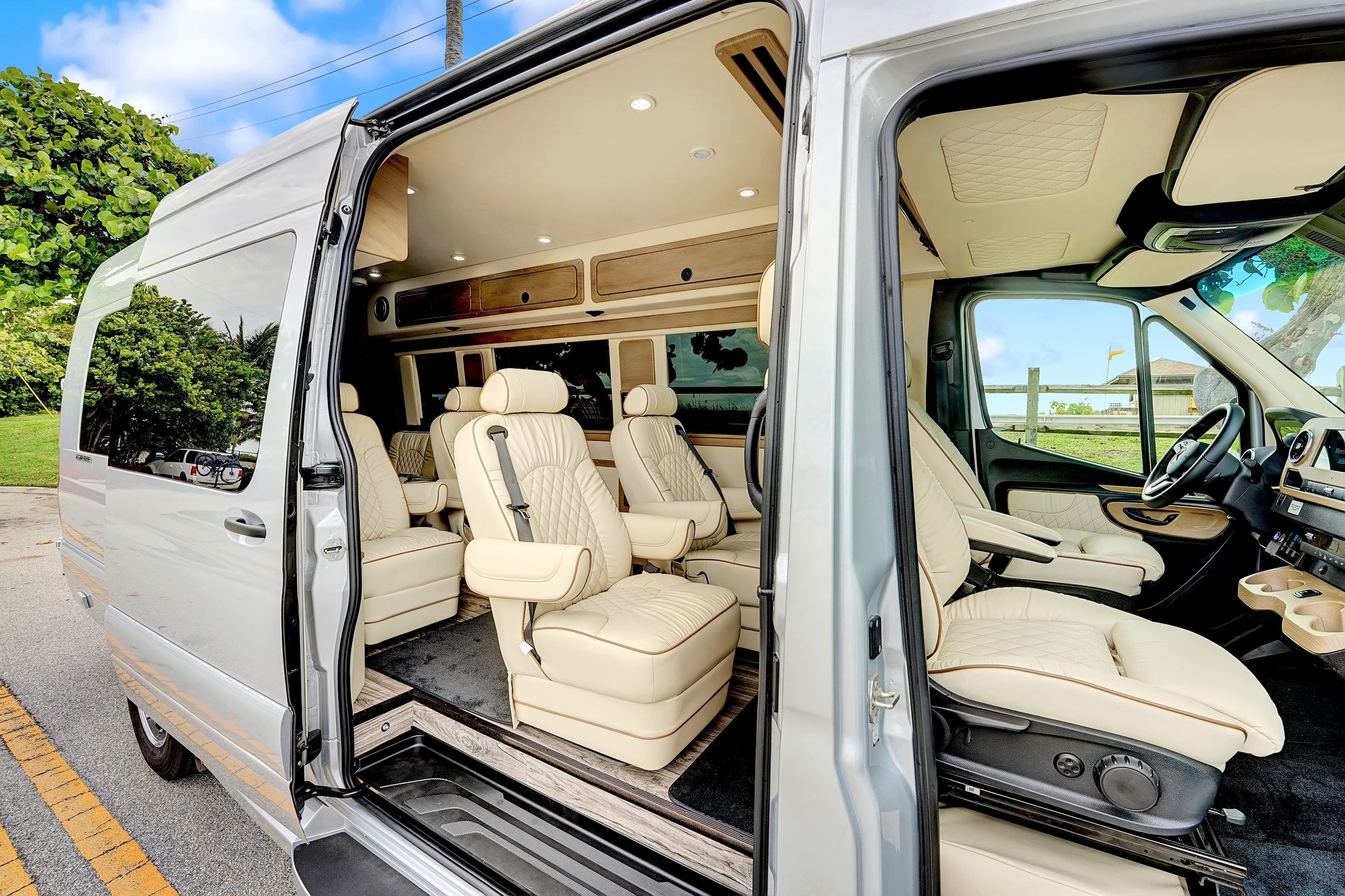 SilverSprinter interior — custom captain chairs, Palm Beach County private property tours